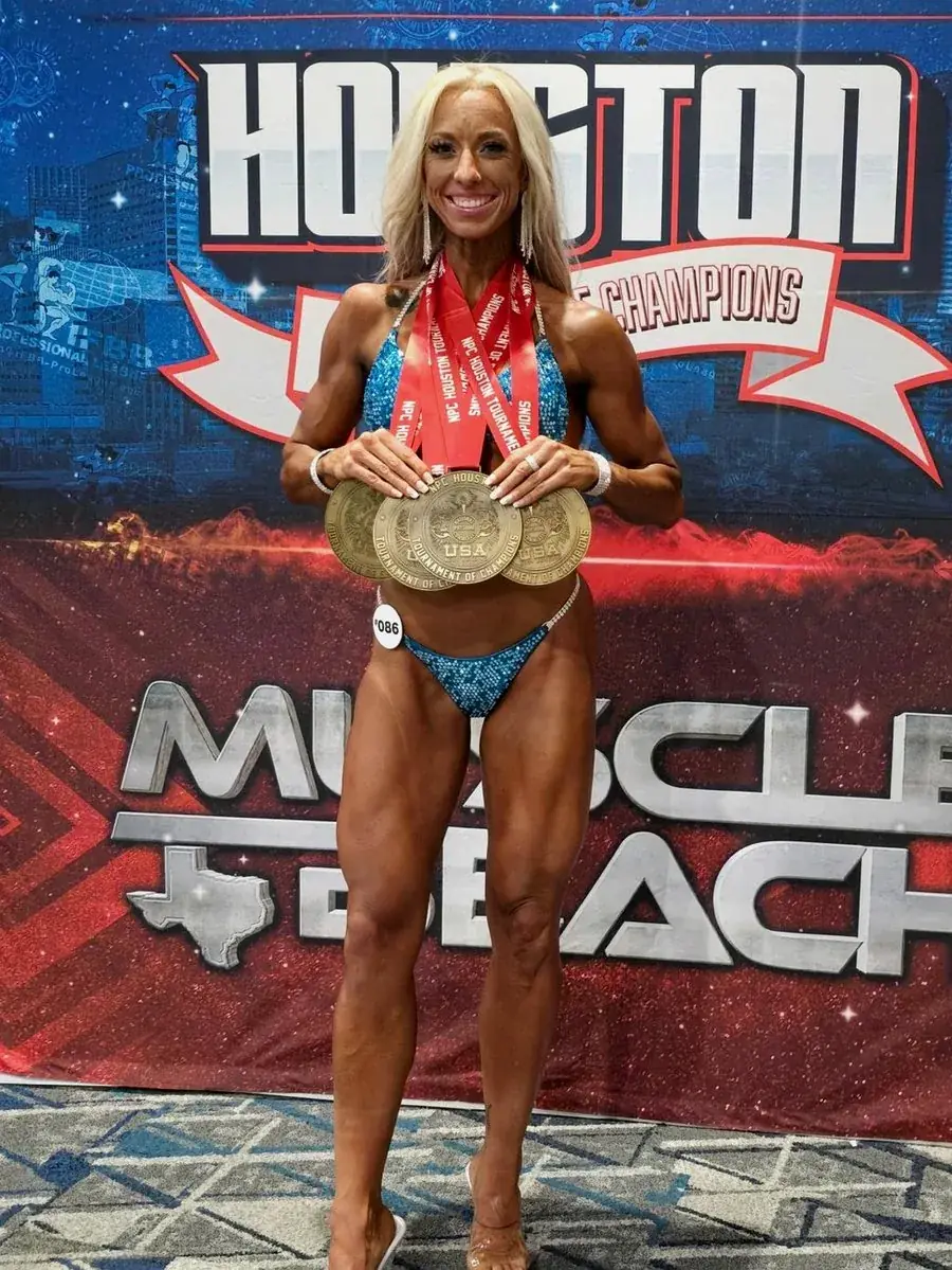Team Kush athlete with Houston Muscle Beach Championship belt