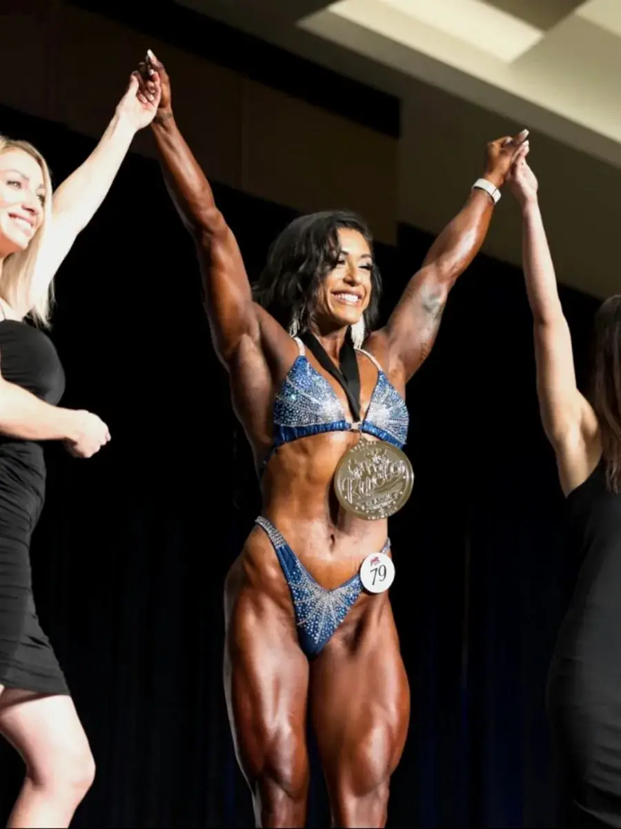 Athletes raising arms in victory